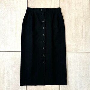 Vintage 90s black button up high waisted pure wool skirt.